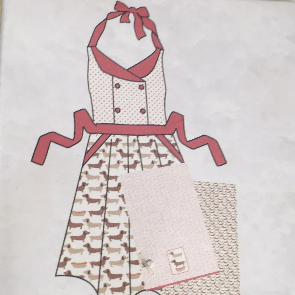 Dachshund themed apron and dish towel set .